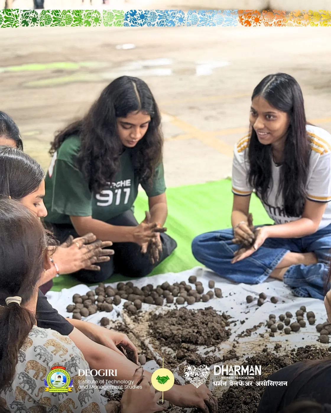 Deogiri Institute students rolling seed balls in a circle.