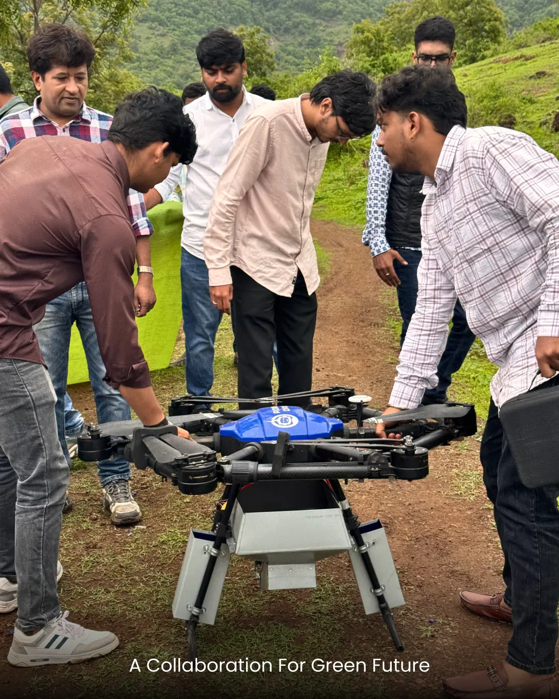 Volunteers preparing the drone for a dispersal run.