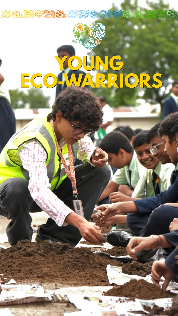 School children pressing seeds into soil alongside a Dharman volunteer.
